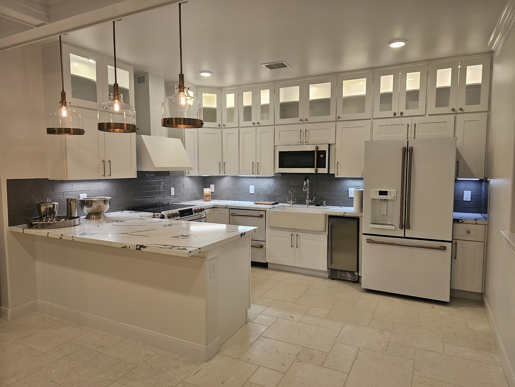 Renovated kitchen with white cabinets